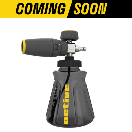 A handheld Active™ Premium Pressure Washer Foam Cannon with a clear bottom container and black top, labeled "Active Products 2.0," displayed over a yellow background with bold text "coming soon" at the top.